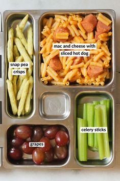 a metal tray filled with different types of food