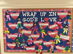 a bulletin board that has been decorated with children's names and hearts