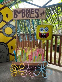 there are many different colored toothbrushes on display in front of a sign that says bubble's 4