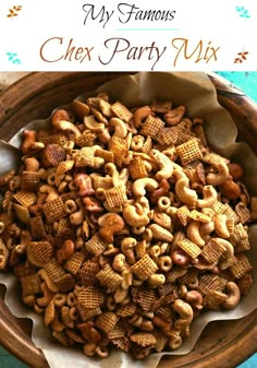 a wooden bowl filled with cereal and nuts