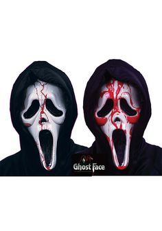 two people in halloween costumes with their mouths open