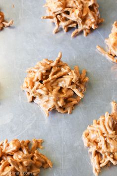 some cookies are on a cookie sheet ready to be baked