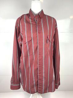 Vintage 90s LEVI’S Silver Label Red Striped Shirt LARGE. Condition is Pre-owned. Shipped with USPS First Class Package. This shirt is in very nice used condition. Very well taken care of. Please check the measurements to ensure that it will fit. Measurements: Pit to Pit: 22 in Wingspan: 65 in Length: 30 in Vintage Levi's Cotton Tops, 90s Red Shirt For Streetwear, 90s Red Streetwear Shirt, 90s Style Red Cotton Shirt, Red Striped Shirt, Very Well, First Class, Striped Shirt, Red Leather Jacket