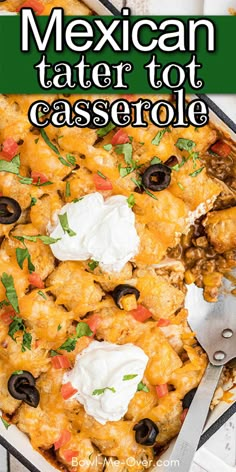 mexican tater tot casserole with sour cream and olives on top