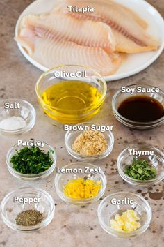 the ingredients for fish seasoning on a table