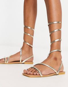 Truffle Collection wrap around minimal sandals in gold metallic | ASOS Metallic Summer Sandals With Wrapped Heel, Metallic Sandals With Wrapped Heel For Summer, Summer Metallic Sandals With Wrapped Heel, Spring Metallic Sandals With Wrapped Heel, Metallic Strappy Sandals For Spring, Spring Metallic Strappy Sandals, Gold Flat Heel Lace-up Sandals For Party, Gold Ankle Wrap Sandals For Party, Chic Gold Ankle Wrap Sandals