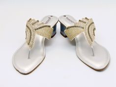 Silver beaded embroidered design strap sandals offer a comfortable sole to walk on. They are beaded with Silver, light gold Rhinestones and Silver beads. These shoes are absolutely comfortable and offer a simple yet elegant design. These are perfect for a night out or a simple day. See our page for more of our collection of shoes we offer. We ship out in a timely matter, wrapped in care for a safe secure trip to your location. Thank you for supporting our small business. Shipped from the USA. Si Elegant Beaded Round Toe Sandals, Gold Embellished Low Heel Sandals, Traditional Gold Sandals For Formal Occasions, Traditional Embellished Sandals For Formal Occasions, Traditional Formal Embellished Sandals, 2 Inch Heels, Gold Rhinestone, Footwear Design Women, Embroidered Design