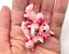 These adorable little pink resin axolotl charms are perfect for making jewelry, key chains, and more! Each little axolotl measures 26 millimeters long, and this listing is for 5 charms.  These axolotls are available just as miniatures without the loops too at the link below. https://www.etsy.com/listing/1196751793/5pcs-pink-axolotl-miniatures-resin US orders over $35 ship free! Kawaii Pink Jewelry For Valentine's Day, Pink Kawaii Jewelry For Valentine's Day, Cute Pink Handmade Jewelry, Cute Pink Resin Necklace, Cute Handmade Pink Jewelry, Cute Pink Nickel-free Jewelry, Novelty Pink Resin Jewelry, Fun Pink Jewelry With Lobster Clasp, Handmade Small Pink Jewelry