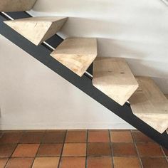 the stairs are made out of wood and metal