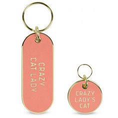 a pink and gold keychain with the words crazy lady's cat on it