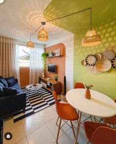 a living room filled with furniture and decor