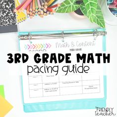 the 3rd grade math practice guide with pencils and crayon pens on it