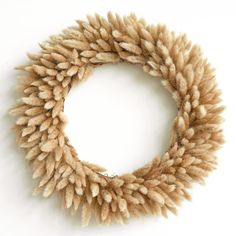 a close up of a wreath on a white background