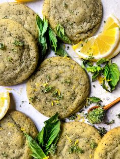 several cookies with herbs and lemon slices