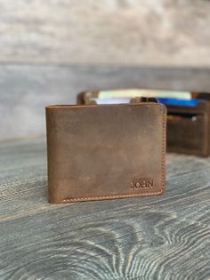 "Personalized Wallet, Valentines Day Gift for Him, Engraved Wallet, Men's Wallet, Custom Wallet, Leather Wallet, Gift for Dad, Boyfriend Gift for Men Our medium bi-fold will replace all those wallets you go through every couple years. It is perfect gift for Father's Day, Valentine's Day, Christmas, Graduation, Birthday for your dear ones. SUPER MINIMALIST & SLIM: This leather wallet is extremely convenient to be carried around in your front or back pocket. PRODUCT DIMENSIONS When it is close Engraved Wallet, Custom Wallet, Mens Wallet, Personalized Wallet, Valentines Day Gifts For Him, Wallet Gifts, Leather Bifold Wallet, Money Clip Wallet, Leather Wallet Mens