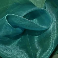 the fabric is very shiny and bright green