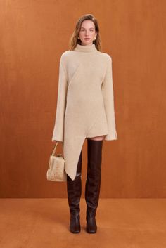 An asymmetrical ribbed knit mini dress with flare sleeves and turtleneck. — Asymmetrical design — Ribbed knit — Flare sleeves — Turtleneck — Runs large, we recommend sizing down Jersey Day, Icon Clothing, Evening Flats, Flare Sleeves, Sandal Platform, Swimming Bag, Knit Mini Dress, Asymmetrical Design, Fall Shopping