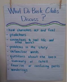 a white board with writing on it that says what do book clubs discuss?