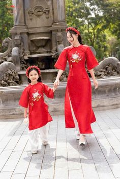 🌿 This set includes traditional Ao Dai, pants For Girls Style: Traditional Material: Very well made with high-quality silk Collar: crew collar Please provide bust-waist-and hip measurements when placing your order to ensure the best fit for you. 🌿 NOTE: * Recommend gentle washing * Please contact us for any inquiries about size. We don't have an exchange policy for the wrong size * It is safe for a washer and dryer in a "delicate" setting. * Actual Ao Dai colors may differ up to 10% due to lightning and viewing devices. * These ao dai pants are made based on Vietnamese size; they will run smaller than American size. *3D printed ao dai: you may see some white broken fabric around the seam (collar). *There might be some chalk/ pen writings on the fabric because it is brand new, unwashed ao Traditional Festive Cheongsam For Ceremonial Occasions, Traditional Festive Ceremonial Cheongsam, Traditional Festive Cheongsam For Ceremony, Traditional Fitted Cheongsam For Ceremonies, Fitted Traditional Cheongsam For Ceremonies, Festive Traditional Short Sleeve Cheongsam, Festive Traditional Cheongsam With Short Sleeves, Traditional Full-length Embroidered Sets, Traditional Embroidered Full-length Sets