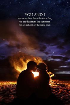 two people sitting in front of a fire with the words you and i on it