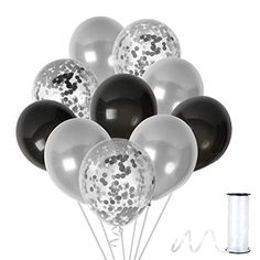 black and white balloons with silver confetti on them