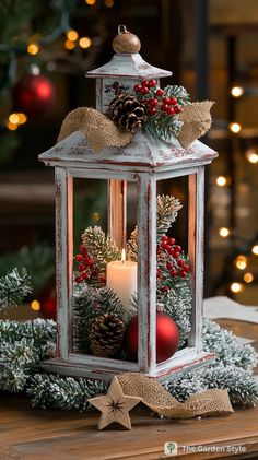 a lantern with christmas decorations on it