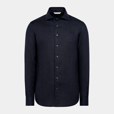 This casual navy tailored fit shirt is cut to a shorter length for versatile styling, and crafted with ultra-fine stitching, heat-sealed buttons and classic widespread collar. Navy Slim Fit Collared Shirt, Navy Collared Slim Fit Shirt, Navy Casual Shirt For Business, Navy Fitted Dress Shirt For Work, Navy Fitted Dress Shirt For Formal Occasions, Navy Fitted Formal Dress Shirt, Business Tops With Spread Collar And Placket, Classic Fitted Tops With Straight Hem, Navy Long Sleeve Business Shirt