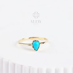 ABOUT PRODUCT  This 14K Gold Pear Turquoise Ring is suitable gift for girlfriend, mom and her. You can even buy as a birthday gift for your friends or anniversary gifts, If you want to add a special note we can write for you and put to inside of package. We manufacture our jewelry pieces with carefully and after production we double checking in quality control department. Our main idea is keep our items for daily wearing especially for minimalist jewelry pieces. 14K Gold Pear Turquoise Ring, Custom Ring For Mom, Turquoise Solitaire Engagement Ring, Basic Natural Stone, Personalized Drop Ring Gift For Her, Christmas, Fathers Day New Year, Mothers Day, Valentines Day, Anniversary, Birthday Gift ITEM DETAILS Material: 14K Gold (Solid Gold) Approx: 1.10 gram Available colors: Gold, Rose Gold, Delicate Fashion, Ring For Mom, Drop Ring, Minimal Ring, Ring Turquoise, Light Ring, Main Idea, Custom Ring, Ring Stacking