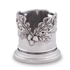 a silver napkin holder with holly leaves and berries on the front, sitting on a white background