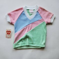 Shipped with USPS First Class. 60% polyester 40% cotton True deadstock Vintage, probably dates to the 80s USA Made This is Terry cloth and it is very soft especially after washing. This does have some fading on the left shoulder from hanging up. Size 18 months These are Pastel colors Pastel Pink Clothes, Pastel Tshirt, Pastel Shorts, Girls Tshirt, Comfy Clothing, 80s Shirts, Unique Toys, Vintage Usa, Clothing Inspiration