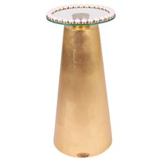 a gold vase with pearls on the top is shown against a white background and has a green edge