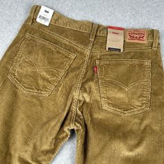 Upgrade Your Wardrobe With These Stylish Levi's Pants In A Classic Brown Corduroy Fabric. The Pants Feature A Flat Front And Straight Leg Style With A 30-Inch Inseam, Perfect For Any Casual Occasion. The Waist Size Is 32 Inches, And The Pants Come With A Zip And Button Closure For A Secure Fit. These Pants Are Easy To Care For And Machine Washable, Making Them A Practical Addition To Your Closet. The Levi's 500 Series Product Line Ensures Quality And Durability, While The Slimming And Stretch Fe Corduroy Pants Men, Levis Pants, Corduroy Shorts, Corduroy Jeans, Fall Inspo, Classic Brown, Brown Corduroy, Corduroy Fabric, Bell Bottom Pants