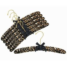 leopard print hangers with bows on them