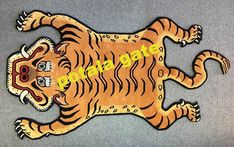 a wooden cutout of a tiger with the word roar on it's chest