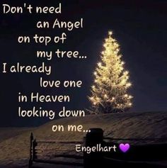 a christmas tree with lights on it and the words don't need an angel on top of my tree i already love one in heaven looking down on me