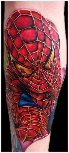 a spider man tattoo on the leg