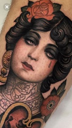 a woman with a rose on her head and an old school tattoo design is shown