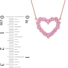 Express your love in the sweetest way when you present this charming pink sapphire open heart necklace, ring and drop earrings set. Fashioned in precious 10K rose gold Each piece features bright pink sapphires glistening along a simple heart-shaped outline. Sapphire is the traditional birthstone for September and symbolizes truth, sincerity and devotion. The 17.0-inch cable chain necklace secures with a spring-ring clasp. The drop earrings secure with lever backs. The ring cannot be resized after purchase. Sapphire Heart Necklace, Open Heart Necklace, Cable Chain Necklace, Peoples Jewellers, Necklace Ring, Open Heart, Pink Sapphire, Earrings Set, Spring Rings