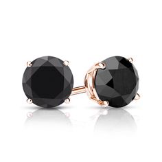 Black diamond stud earrings are a modern trend on a timeless fashion staple. These 2 carat tw black diamond studs are bold, with each round circle cut diamond earring weighing 1 carat each. Set in a 4-prong basket setting, available with lever back or push backings set in 14kt Rose Gold for a perfect compliment of tones to set off the rich colors making these rose gold stud earrings a perfect lasting gift. Mens Earring, Mens Earrings, Black Diamond Pendant, Black Diamond Earrings Studs, Black Diamond Studs, Round Diamond Earrings, Black Diamond Earrings, Solitaire Diamond Pendant, Diamond Earrings Studs Round