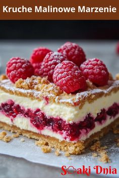 there is a piece of cake with raspberries on top