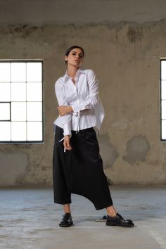 "Introducing our Handcrafted Merino Wool Drop Crotch Pants - Your Ultimate Statement in Luxury and Style! Elevate your fashion game with our meticulously crafted, 100% Merino Cool Wool Drop Crotch Pants, where innovation meets elegance. Designed for those who appreciate the avant-garde, urban, and bold fashion sensibility, these pants are a true embodiment of style and comfort. 🌟 Key Features: 🧶 Luxurious Merino Cool Wool: Crafted from high-quality Merino Cool Wool, our pants exude luxury and Women Baggy Pants, Cotton Harem Pants, Black Harem Pants, Drop Crotch Pants, Harem Pants Women, Slow Fashion Movement, Womens Trousers, Fabric Ideas, Winter Boho