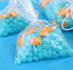 some blue and yellow candies in plastic bags with an arrow pointing to the word seriously nothing takes more than 5 mins but kids are all