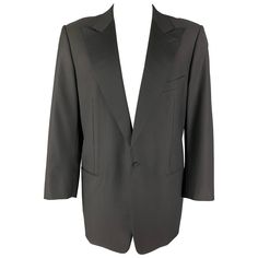 ERMENEGILDO ZEGNA sport coat comes in a black wool with a full liner featuring a peak lapel, slit pockets, and a single button closure. Excellent Pre-Owned Condition. Marked: 58 Measurements: Shoulder: 19 inches Chest: 48 inches Sleeve: 25.5 inches Length: 33.5 inches Reference: 123455 Category: Sport Coat More Details Brand: ERMENEGILDO ZEGNA Chest Size: 48 Sport Coat Leng: Short Color: Black Pattern: Solid Fabric: Wool Style: Tuxedo Age Group: Adult Gender: Male Sport Court, Ermenegildo Zegna, Outerwear Coats, Black Pattern, Black Wool, Sport Coat, Fashion Outfits, Wool, Clothes