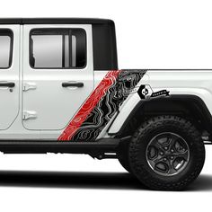 a white jeep with red and black designs on the side