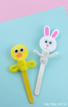 an easter bunny and a duck on a stick