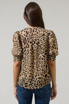 The Clare Leopard Devon Button Down Blouse is here to capture your heart, with its beautiful leopard print. Shoulder pleated half sleeves frame this top with a button-down placket in the front. Wear it tucked into high waisted bottoms with shoes of your choice. - Puff sleeve- Button down- Blouse- Leopard- Color: Black TanSize + Fit - Model is 5'9" and wearing size XS- Measurements taken from size S - Chest: 20"- Length: 25 1/2" Fabric Self: 100% Polyester, Lining: 97% Polyester 3% Spandex Style Ruffled Maxi Dress, Black Blouse, Black And Tan, Devon, Half Sleeves, Button Downs, Puff Sleeve, Leopard Print, Fitness Models