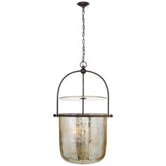 a hanging light fixture with an old - fashioned glass bowl and metal chain around it