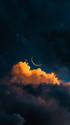 the moon is shining brightly in the night sky with clouds and stars around it,