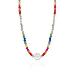 Brighten up her day with our adorable Smiley Face Beaded Necklace. This charming necklace features a string of vibrant beads, with a cheerful smiley face pendant at the center. The playful design and vibrant colors make it a perfect accessory for girls who love to express their fun and joyful personalities. Crafted with high-quality materials, this necklace is durable and comfortable to wear. Delight her with this happy and stylish accessory that will bring a smile to her face wherever she goes. Playful Multicolor Friendship Necklaces, Playful Colorful Beaded Necklaces, Playful Multicolor Beaded Necklaces, Smile Beads Necklace, Playful Rainbow Beaded Necklaces With Letter Beads, Multicolor Smiley Face Jewelry For Everyday, Pink Smiley Face Round Beaded Jewelry, Pink Smiley Face Round Bead Jewelry, Playful Rainbow Letter Beads Necklace