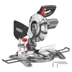 a circular sliding miter with tools attached to the blade and attachments on it